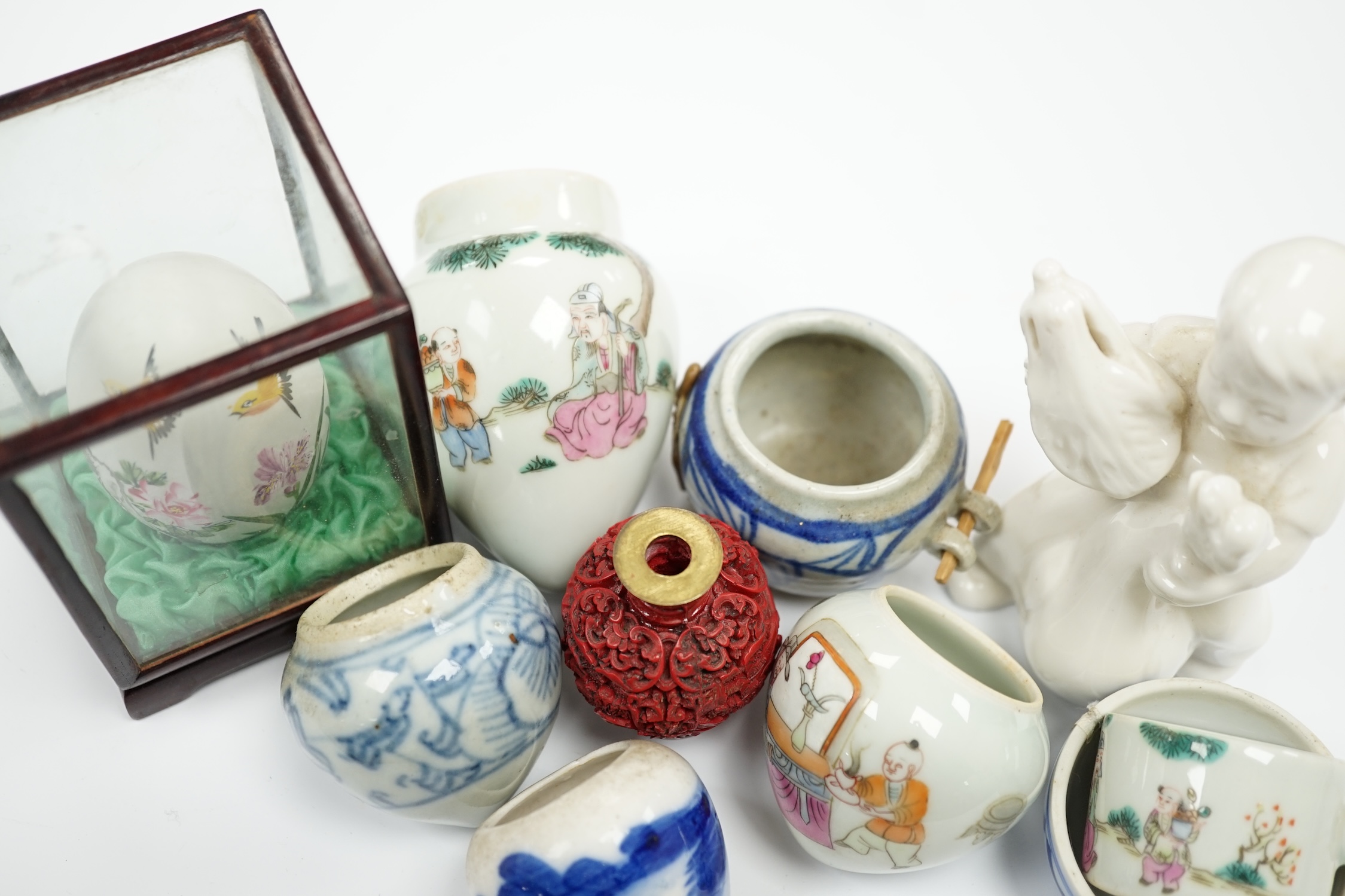 A group of small Chinese bowls, a blanc de chine figure, a cinnabar lacquer miniature vase, etc. largest 9cm high